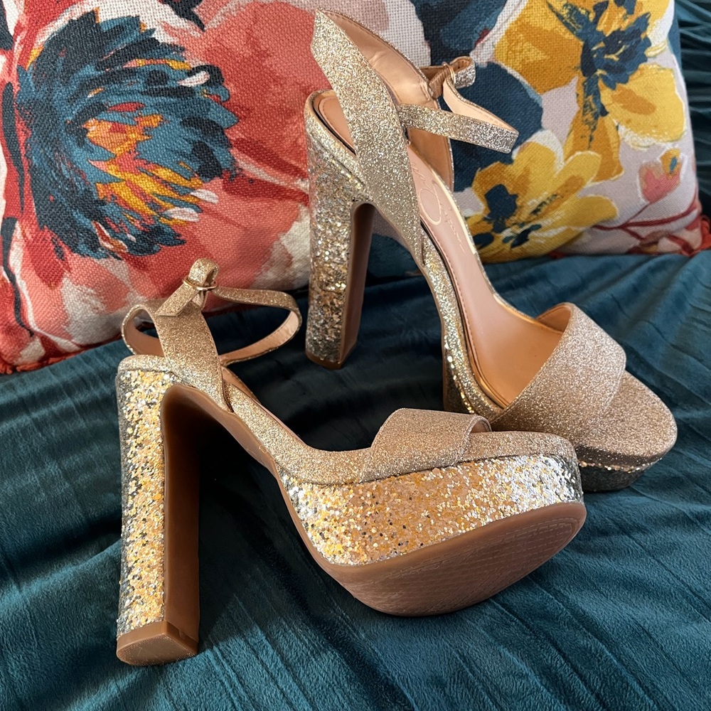 Jessica’s Simpson gold glitter platform heels.